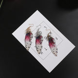 Boucles d'oreille ailes de fée, ailes de papillons bordeaux et strass - BIJOUX - THE FASHION PARADOX