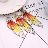 Boucles d'oreille ailes de fée, ailes de papillons orange couleurs feu et strass - BIJOUX - THE FASHION PARADOX