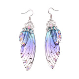 Boucles d'oreille ailes de fée, ailes de papillons bleues violettes et strass - BIJOUX - THE FASHION PARADOX