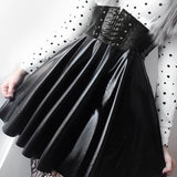 Jupe patineuse noire en simili cuir vegan ceinture serre taille - Jupes - THE FASHION PARADOX