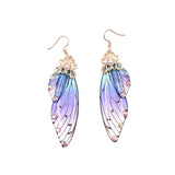 Boucles d'oreille ailes de fée, ailes de papillons bleues violettes et strass - BIJOUX - THE FASHION PARADOX