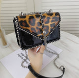 Petit sac à main rectangulaire noir et imprimé léopard verni-Accessoires-THE FASHION PARADOX
