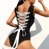 Body noir, blanc ou bleu élégant laçage ruban dans le dos - Bodys - THE FASHION PARADOX