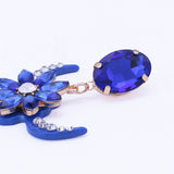 Boucles d'oreille tête de buffle, strass noir, rose, blanc, orange ou bleu - BIJOUX - THE FASHION PARADOX