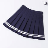Mini jupe short écolière plissée rose, noire, marine ou blanche - Jupes - THE FASHION PARADOX
