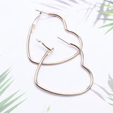 Boucles d'oreille anneaux en forme de coeur dorés ou argentés - BIJOUX - THE FASHION PARADOX