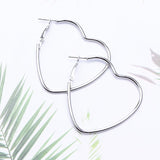 Boucles d'oreille anneaux en forme de coeur dorés ou argentés - BIJOUX - THE FASHION PARADOX