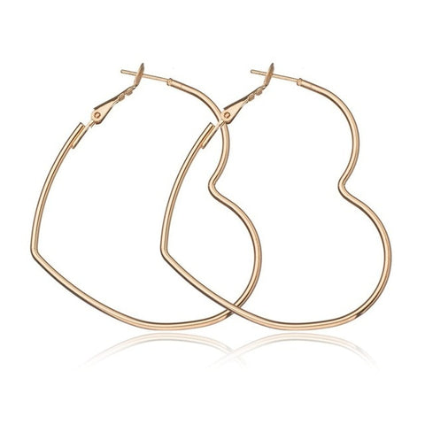 Boucles d'oreille anneaux en forme de coeur dorés ou argentés - BIJOUX - THE FASHION PARADOX