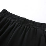 Pantalon short noir style jogging en résille imprimé "such cute" - Pantalons - THE FASHION PARADOX