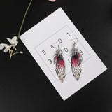 Boucles d'oreille ailes de fée, ailes de papillons bordeaux et strass - BIJOUX - THE FASHION PARADOX