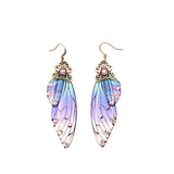 Boucles d'oreille ailes de fée, ailes de papillons bleues violettes et strass - BIJOUX - THE FASHION PARADOX