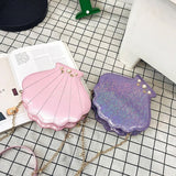 Petit sac à main en simili cuir végan coquillage nacré pailleté rose, blanc, noir ou violet - Accessoires - THE FASHION PARADOX
