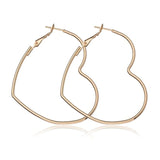 Boucles d'oreille anneaux en forme de coeur dorés ou argentés - BIJOUX - THE FASHION PARADOX